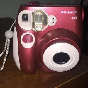 New poloroid 300 camera  (burgundy/red)